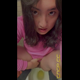 Emi squats over a toilet facing the camera and rubs herself while she pushes out a shit. Her face is visible throughout and her turds can be seen in the bowl below her. Vertical format video. Over 8 minutes.